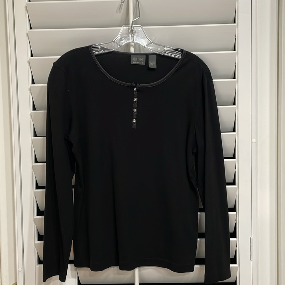 Chico’s Additions, size 2 (12/14). Black Long Sleeve Tee/ rhinestone buttons